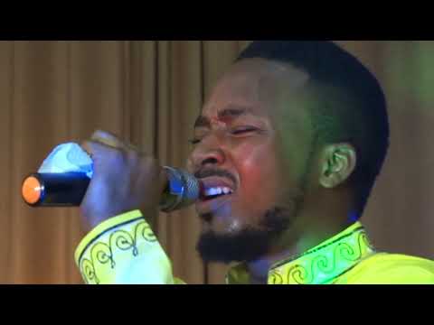 Prosper Menko ministering I lift my hands in worship Live at FAMUC 2014