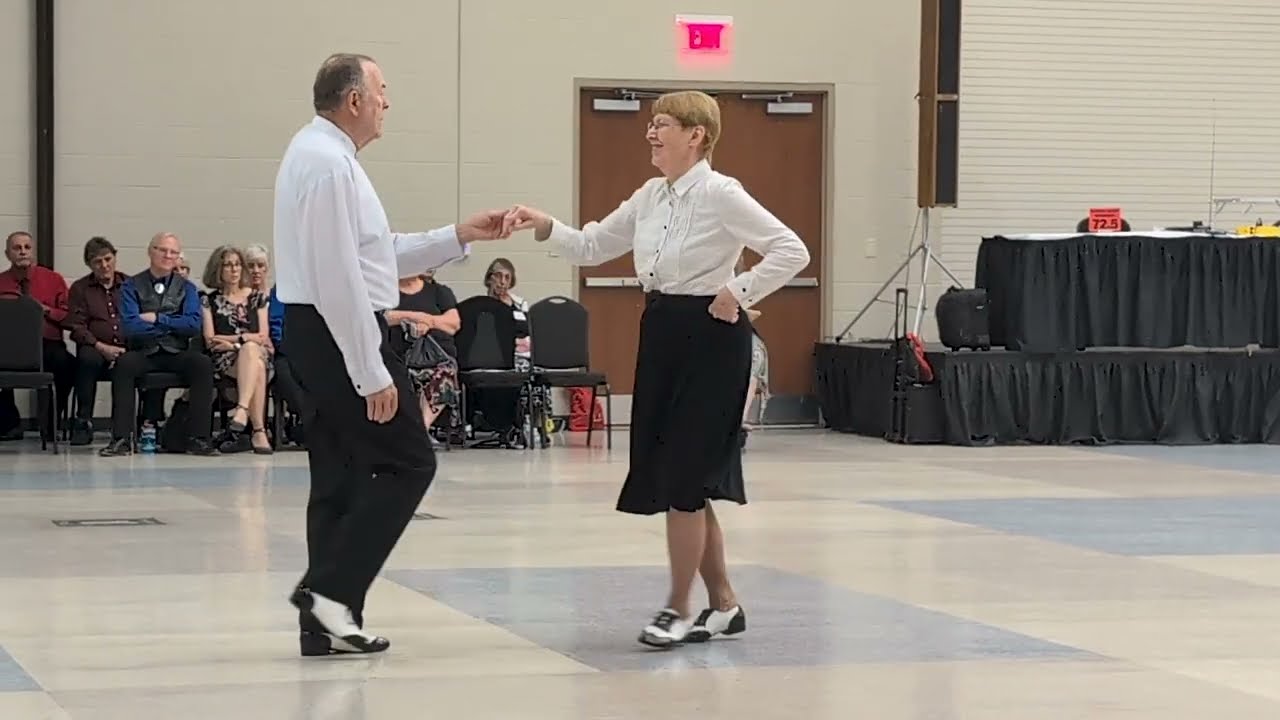 Carolyn & Tony Ahart performing a demonstration dance at the 75th National Square Dance Convention in Waco, TX.
