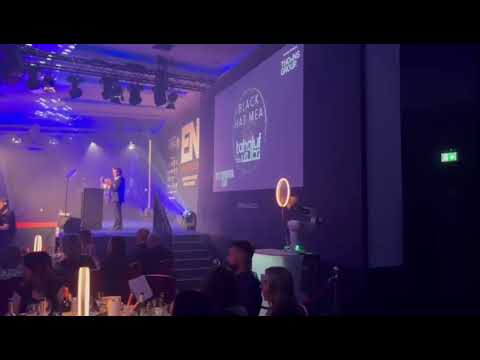 Maestro robots and neon rings on stage at the EN Awards, Park Plaza Westminster