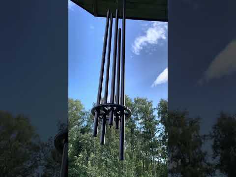 Wind chimes tuned to Am7/D, in a strong breeze