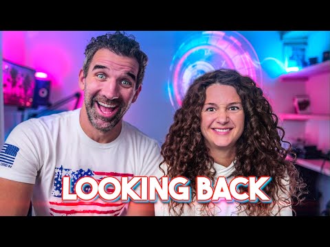 Two friends pose for a cheerful thumbnail with pink and blue neon lighting and a bold 'LOOKING BACK' caption across the bottom.