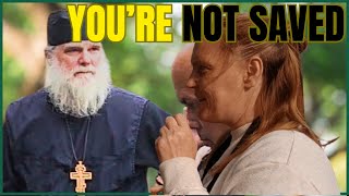 Download the video "Protestant Street Preacher Harasses Orthodox Priest in Public"