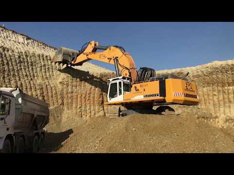 Liebherr 974 Excavator Loading Trucks