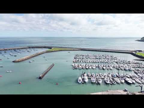 Howth Harbour from above — sunny day done 4K