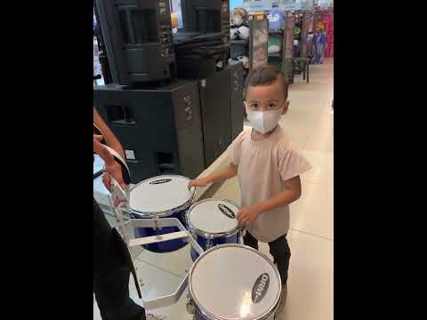 Trying out the triple drum