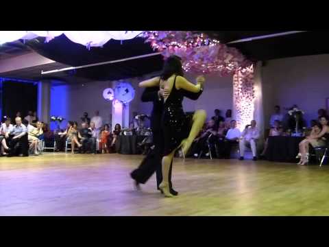  Jose Luis Gonzalez  and  Paulina Cazabon Goméz  are  dancing  to  a  tango