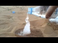 Veden kaataminen aavikolla