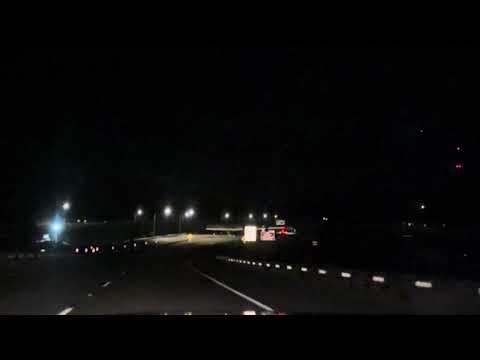 Night cruise with lightning while John Maus plays