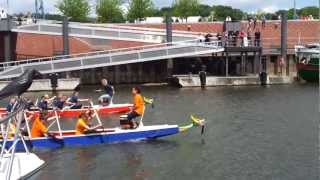preview picture of video 'Hafenfest Boizenburg, Drachenbootrennen: Team Hafenhaie - Bonbonfabrik 09.06.2012'