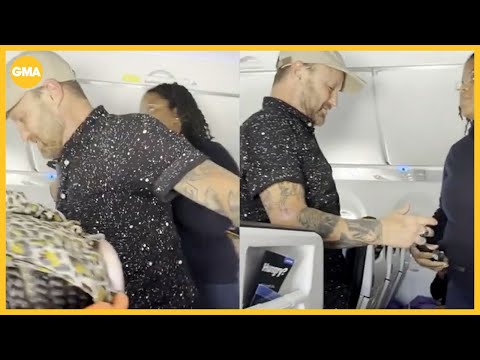 Passenger allegedly spits and harasses other passengers, flight crew. Plane diverts