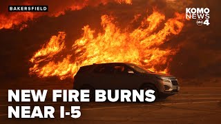 New fast-moving wildfire north of Los Angeles threatens homes, 50,000+ under evacuation orders