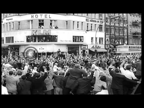 Millions cheering for President John Kennedy on his Europe tour in 1963, visiting...HD Stock Footage