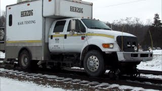 preview picture of video 'BNSF mixed freight meets Herzog rail tester at Agency, Iowa'
