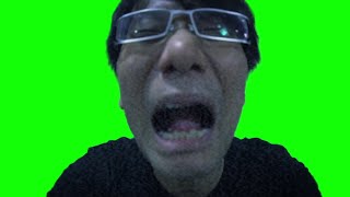 Hideo Kojima screaming help green screen