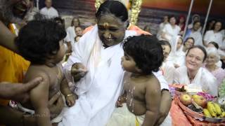 preview picture of video 'Amma feeding two babies & playing'