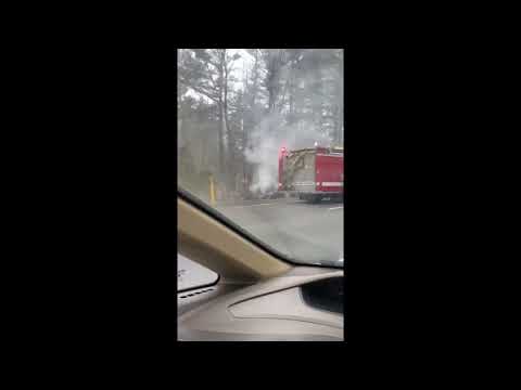 Firefighters deal with a fire in Middleborough off of I-495