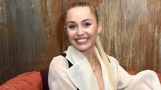 Miley Cyrus REVEALS BABY BUMP!?
