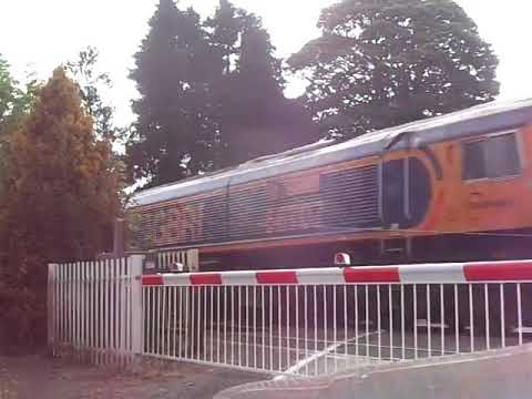 The Class 66 GBRf No.66707 with HYA Hopper Wagons was passed through at Milton Level Crossing.