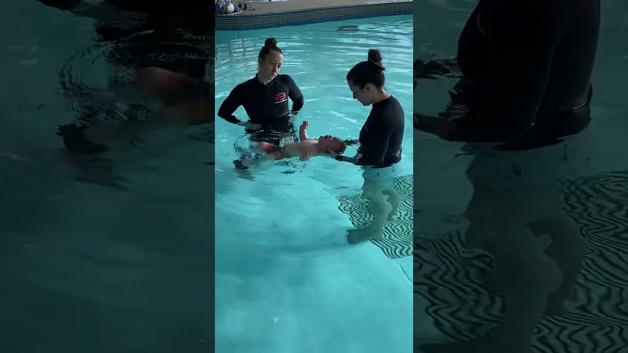 9 month old baby during 2nd day of Infant Aquatics Class