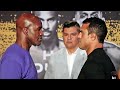 EVANDER HOLYFIELD STARES DOWN VITOR BELFORT IN FIRST FACE TO FACE AT FINAL PRESS CONFERENCE
