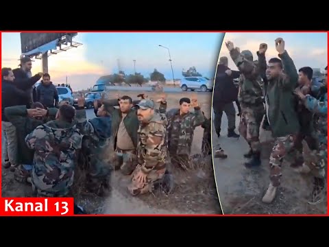 Another group of Assad army lay down weapons and surrender to rebels