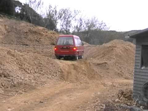 Toyota townace van climbing dirt mound