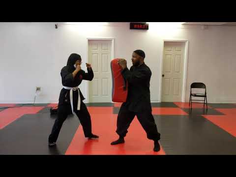 Female Student working on elbow strikes! Speed and power