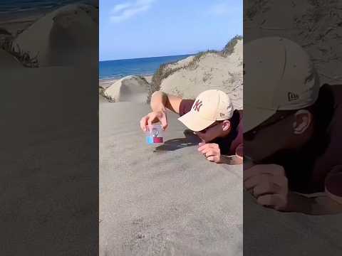 Man Collecting Magnetite on the Beach with Magnet 🧲 | Amazing Discovery #shorts#trending#subscribe