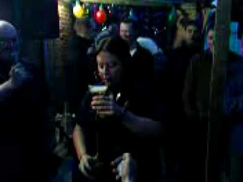 woman drinking half yard of ale in 10 seconds