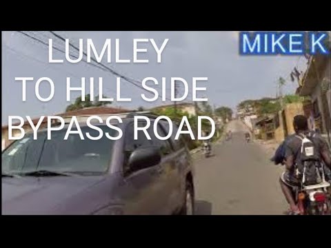 FREETOWN, SIERRA LEONE. BIKE RIDE LUMLEY ROAD TO HILL SIDE BYPASS ROAD.