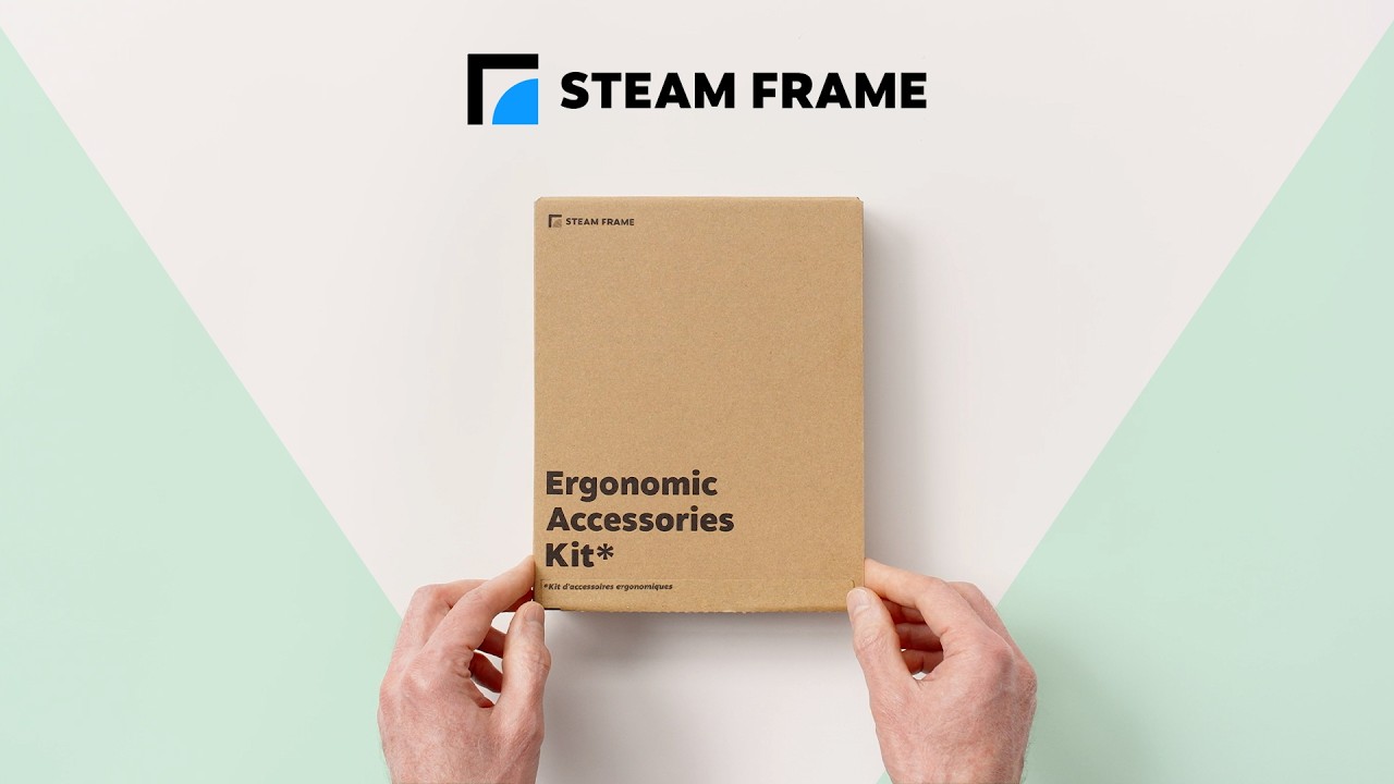 Hands holding the boxed Steam Frame Ergonomic Accessories Kit under the Steam Frame logo