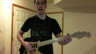 Jacob singing Heathen Town (Elvis Costello) with guitar