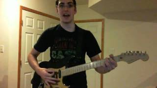 Jacob singing Heathen Town (Elvis Costello) with guitar