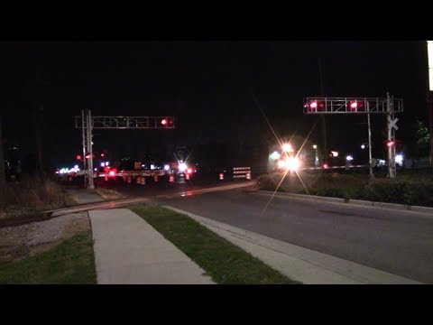 NS 5213 (High Hood), NS 5315, and NS 555041 (Caboose) at Sagamore Parkway in Lafayette, Indiana