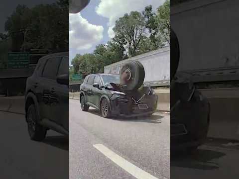 Loose tire tears through SUV on Philadelphia highway