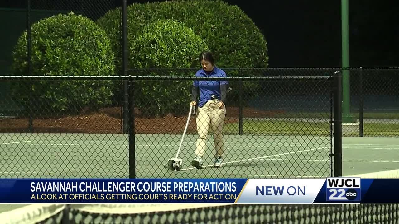 The morning rush to prepare tennis courts for Savannah Challenger Tournament