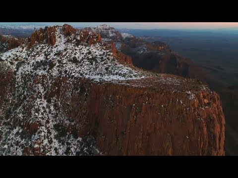 Drone above a snowy Superstition Mountains at Flatiron