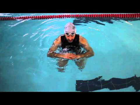 Treading water using a Breaststroke whip kick