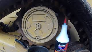 22' CAT 289d3 - Drive motor gear oil change how to