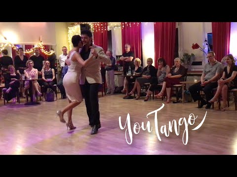  Lucas di Giorgio  and  Jimena Romero Barbieri  are  dancing  to  the  milonga  "  No Hay Tierra Como La Mia  "  by  Francisco Canaro  in  2017
