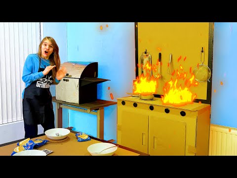 Amelia makes Noodles for Arthur in a cardboard kitchen.
