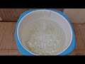 Mesmerizing Water Flow: Filling a Bucket with Tap Water