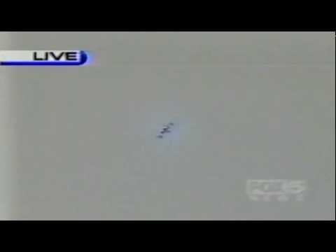 F-15 over lower Manhattan after WTC south tower collapse (WNYW / WPIX / CNN)