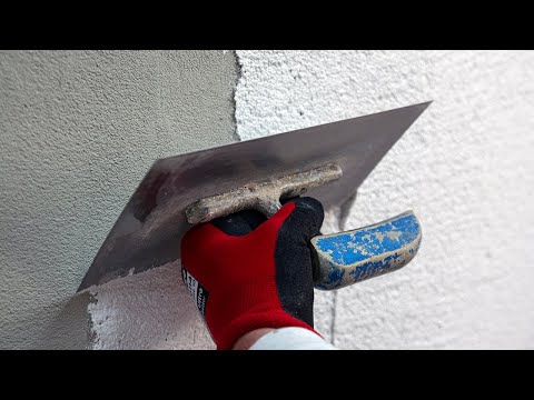 Organischen, dünnschichtigen Siliconharzputz auftragen; Wand/WDVS (Wärmedämmverbundsystem) verputzen