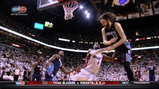 LeBron James takes forearm to throat from Josh McRoberts: Bobcats at Heat
