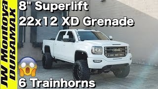 CLEANEST GMC Sierra 1500! 8&quot; LIFT + 22x12 on 35s