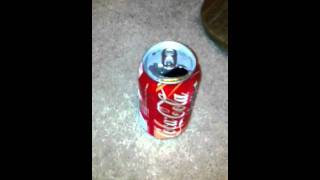 How to open a coke can without sound
