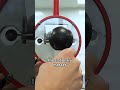 Watch gravity bring these two balls together in real time