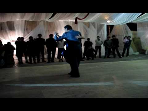  Fabian Peralta  and  Virginia Pandolfi  are  dancing  to  the  tango  "  Cornetin  "
