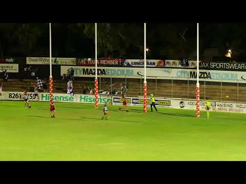 South's Lauren Buchanan kicks a ripper from the boundary